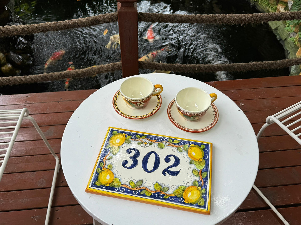 Hand-painted ceramic plate with lemon motif