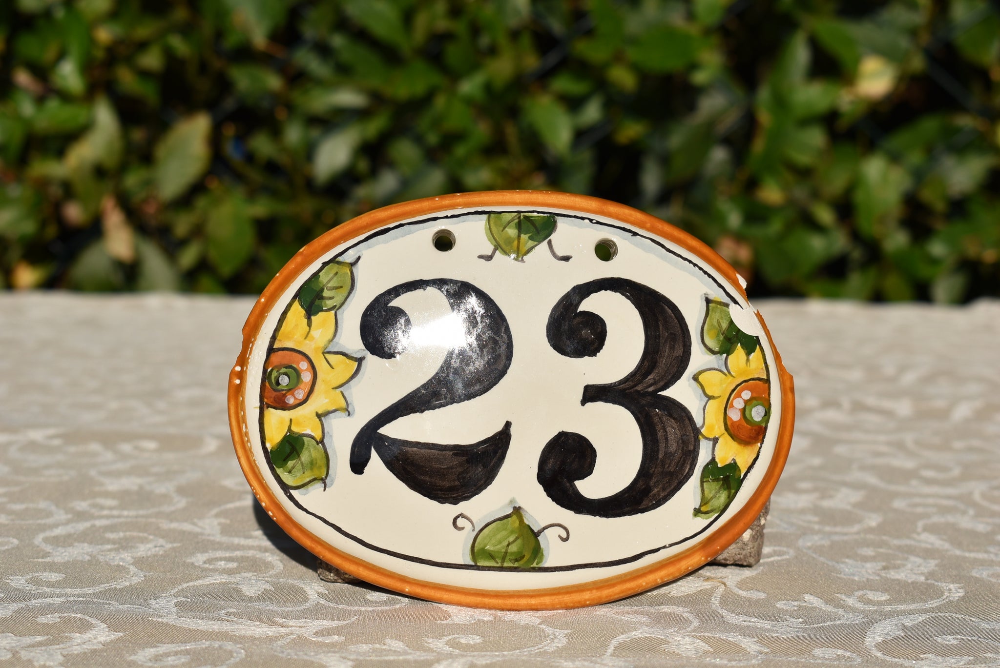 Ceramic tile number