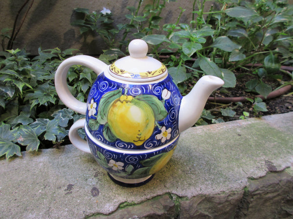 ceramic tea pot and cup